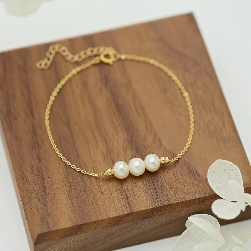 Aria-Gold Pearl Bracelet